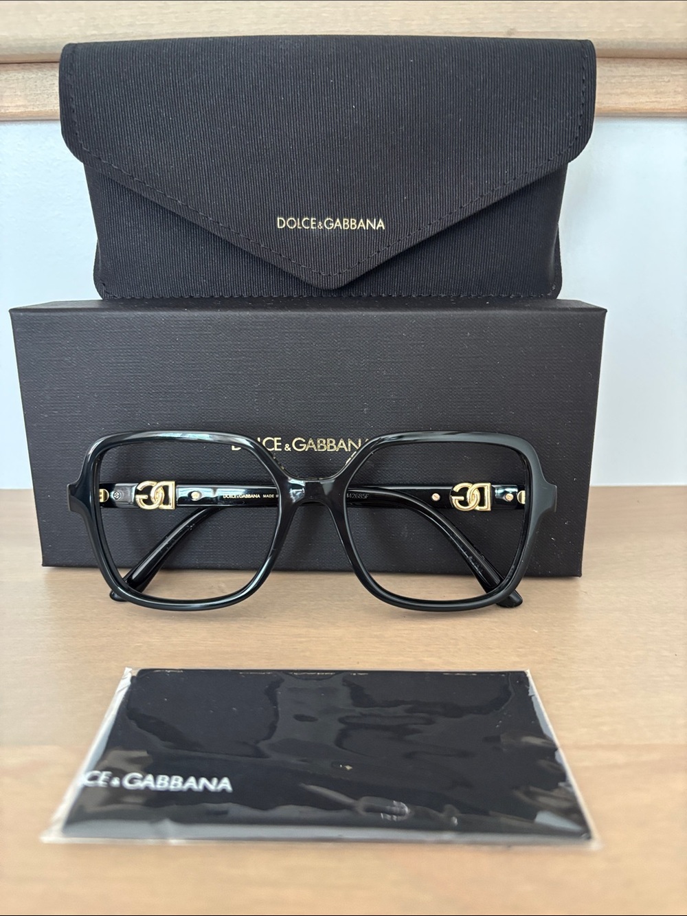 Oversized Women’s Dolce & Gabbana Black Eyeglass Frame with Gold Temple Logo
